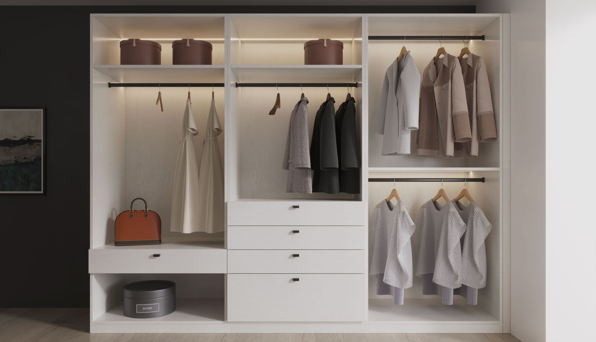 A white vesto form wardrobe with warm integrated lighting, soft-close drawers and full-height hanging